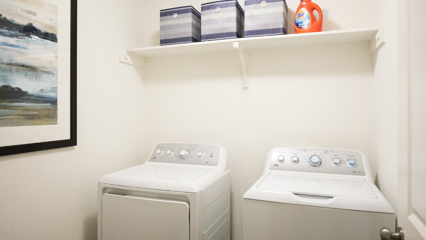1712 Boggy Crk Rnch Road Georgetown, TX 78628 - Photo 15 of 19 a utility room with dryer and washer