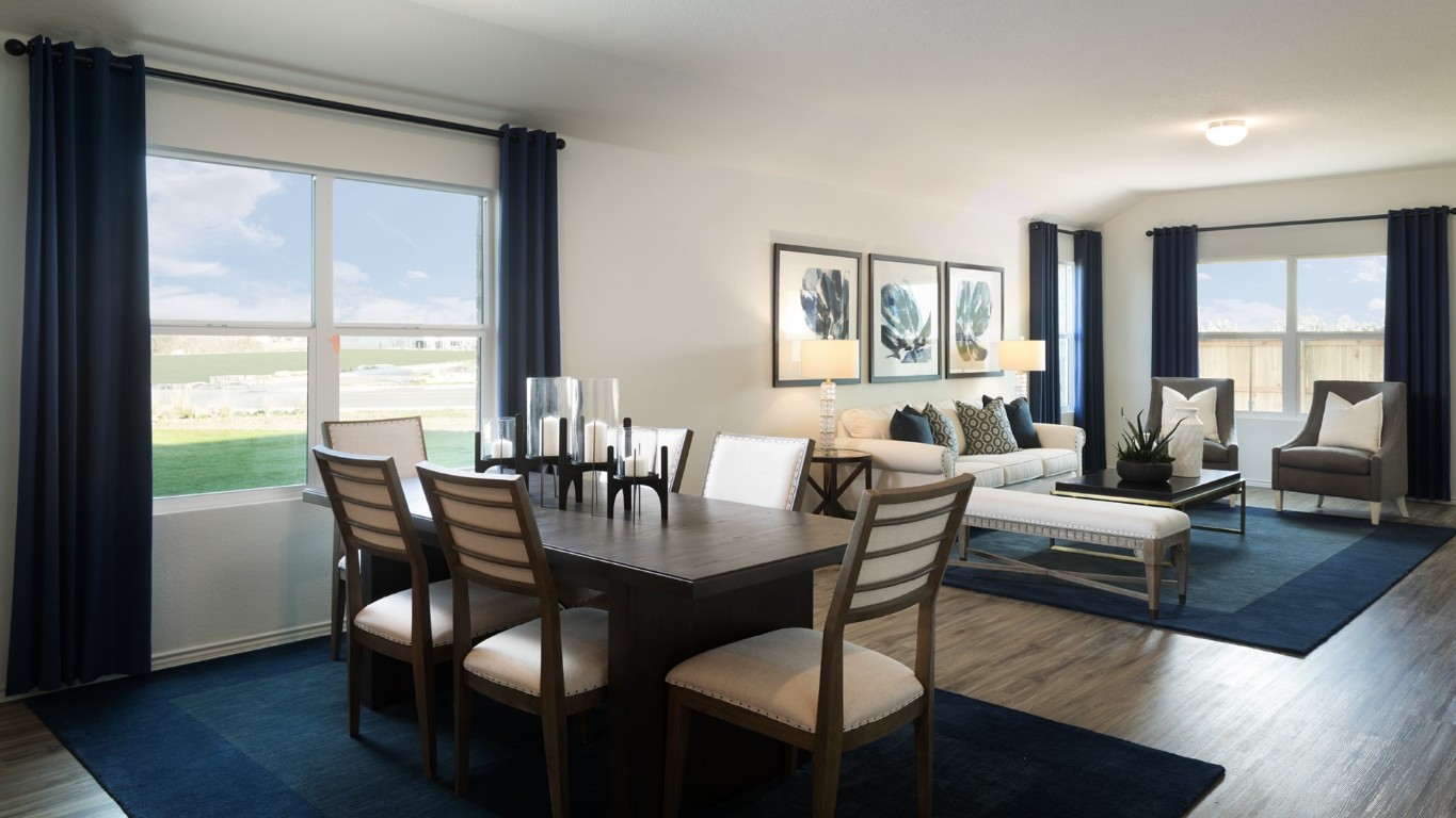 1712 Boggy Crk Rnch Road Georgetown, TX 78628 - Photo 9 of 19 a view of a dining room with furniture window and wooden floor