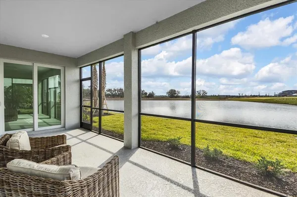 a living room with large windows