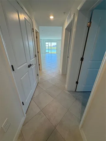 a bathroom with a double vanity sink and mirror