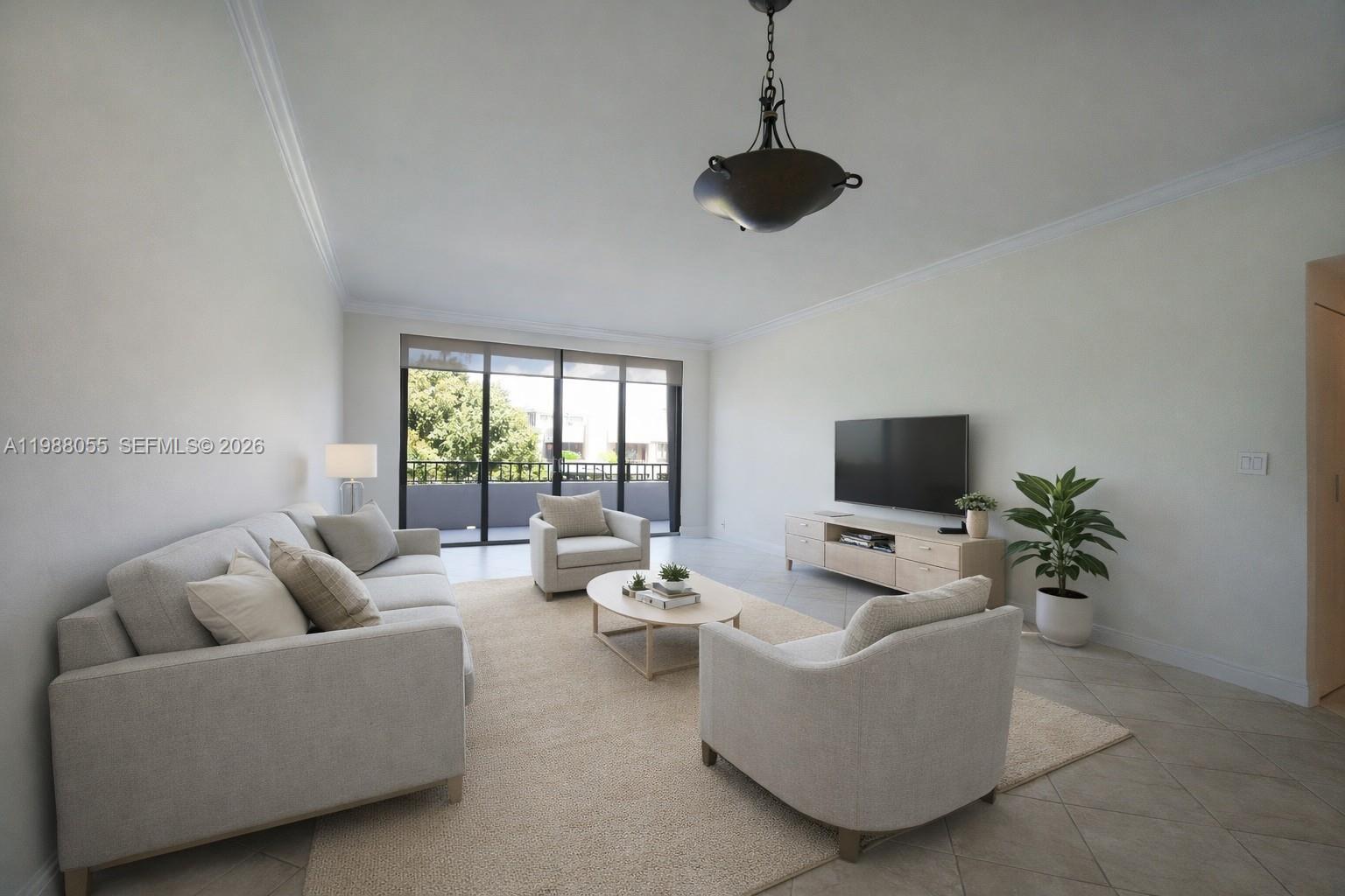 a living room with furniture and a flat screen tv