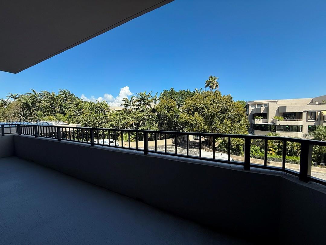 151 Crandon Boulevard, Unit 320 Key Biscayne, FL 33149 - Photo 2 of 10 a view of balcony with furniture