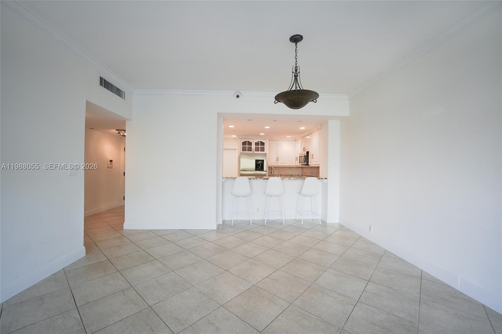 151 Crandon Boulevard, Unit 320 Key Biscayne, FL 33149 - Photo 3 of 10 a view of a kitchen cabinets and window