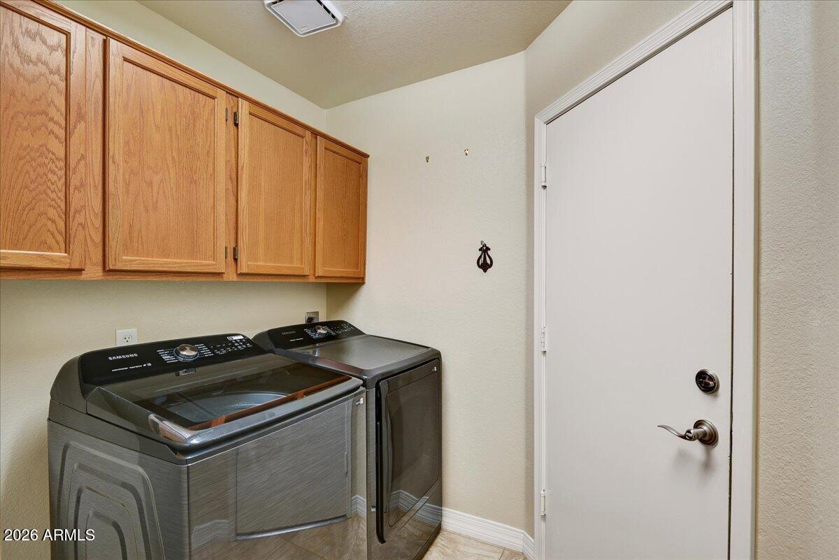 9136 West Rimrock Drive Peoria, AZ 85382 - Photo 20 of 25 a view of a utility room with sink washer and dryer