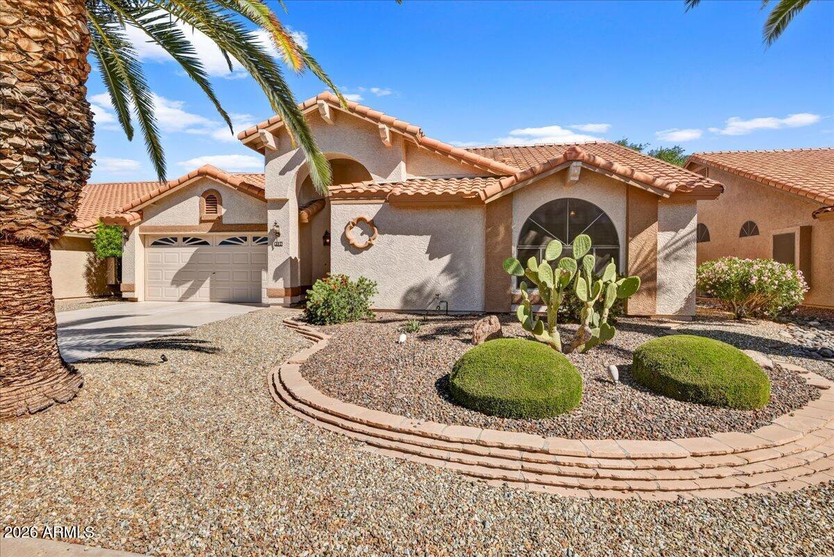 9136 West Rimrock Drive Peoria, AZ 85382 - Photo 25 of 25 a view of a house with a yard