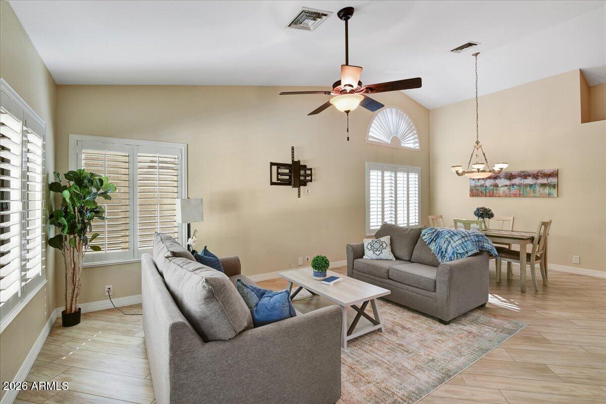 9136 West Rimrock Drive Peoria, AZ 85382 - Photo 4 of 25 a living room with furniture
