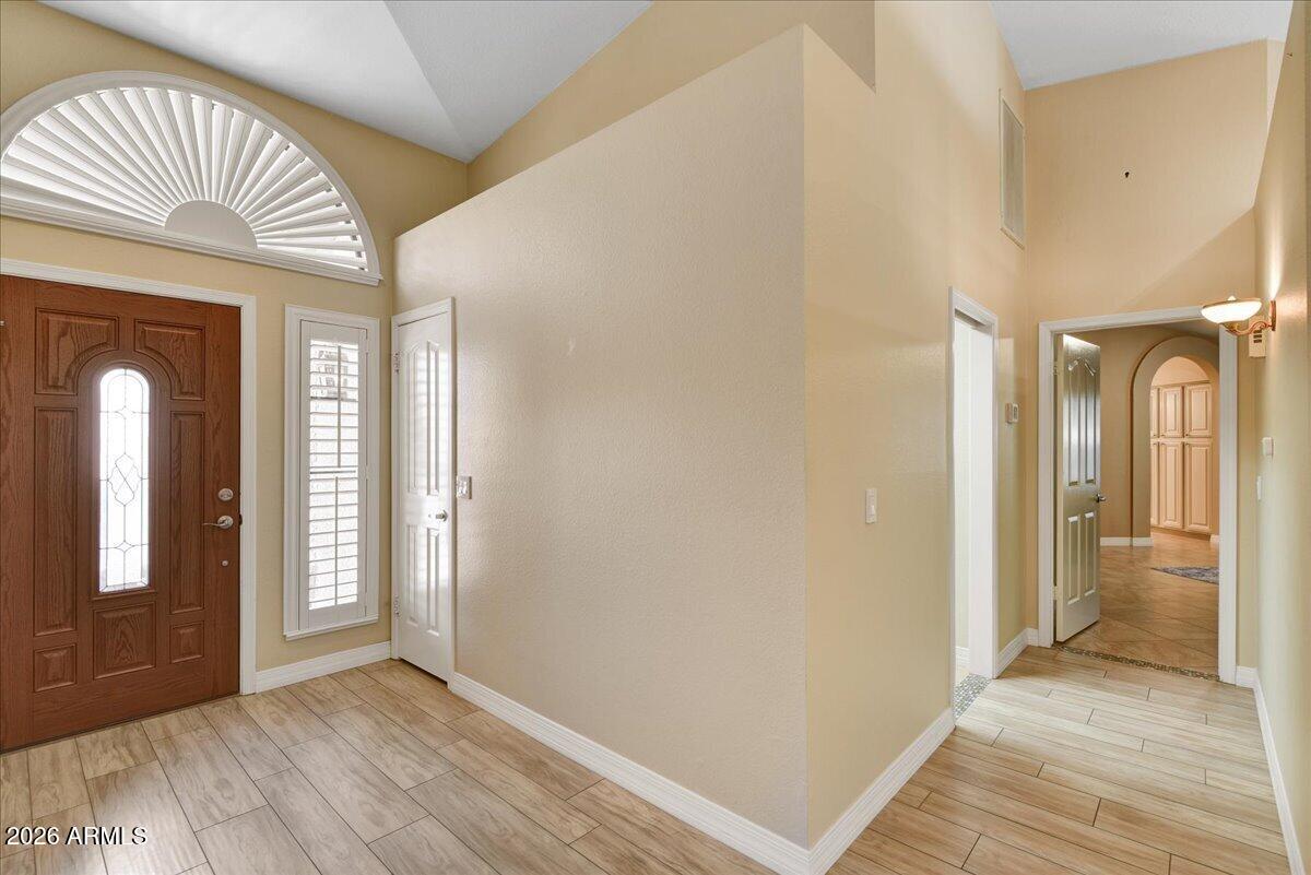 9136 West Rimrock Drive Peoria, AZ 85382 - Photo 6 of 25 a view of an empty room and glass door