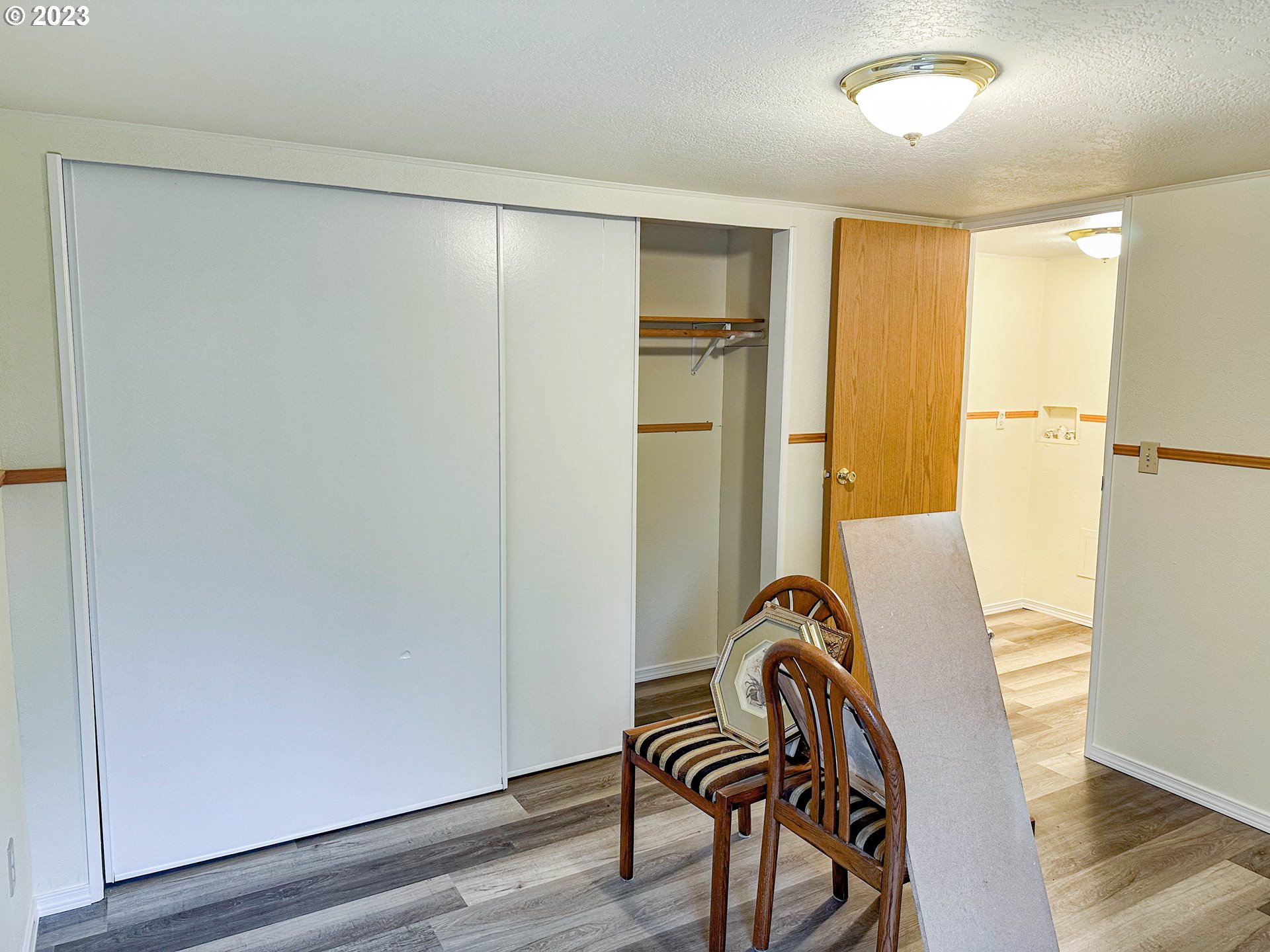4475 Franklin Boulevard, Unit 13 Eugene, OR 97403 - Photo 11 of 22 a view of a room with furniture and wooden floor