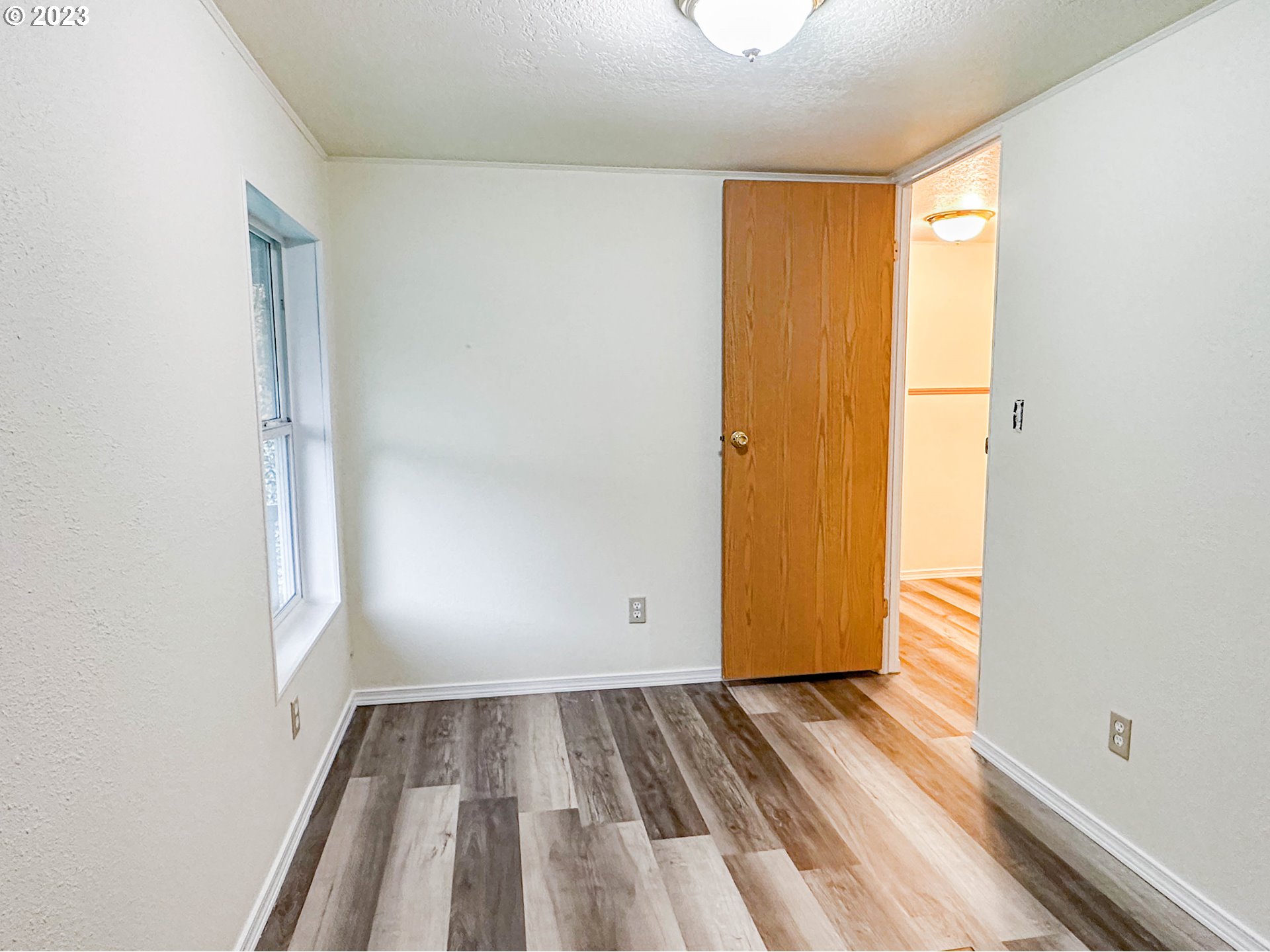 4475 Franklin Boulevard, Unit 13 Eugene, OR 97403 - Photo 13 of 22 a view of walk in closet with wooden floor