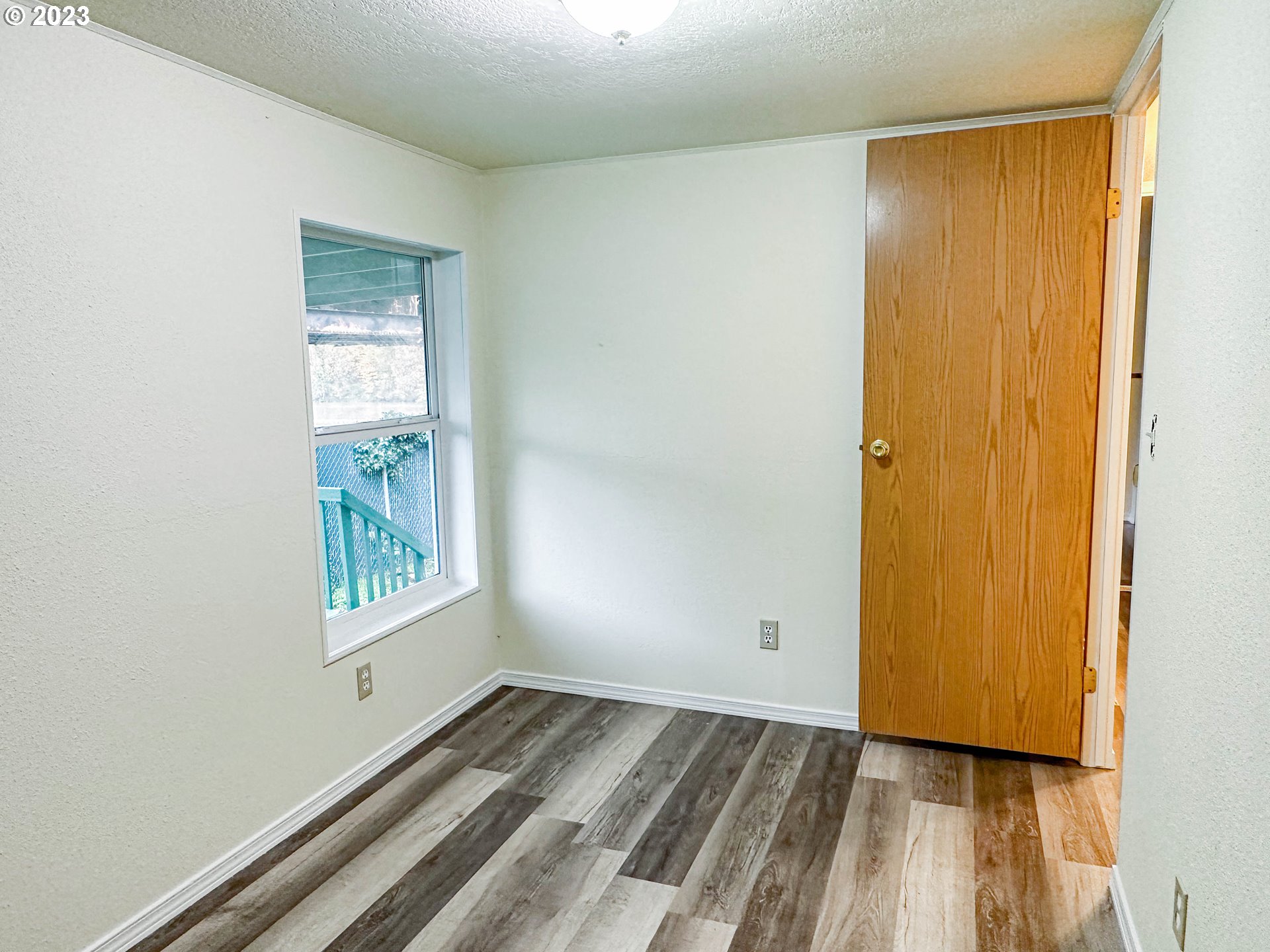 4475 Franklin Boulevard, Unit 13 Eugene, OR 97403 - Photo 14 of 22 an empty room with windows