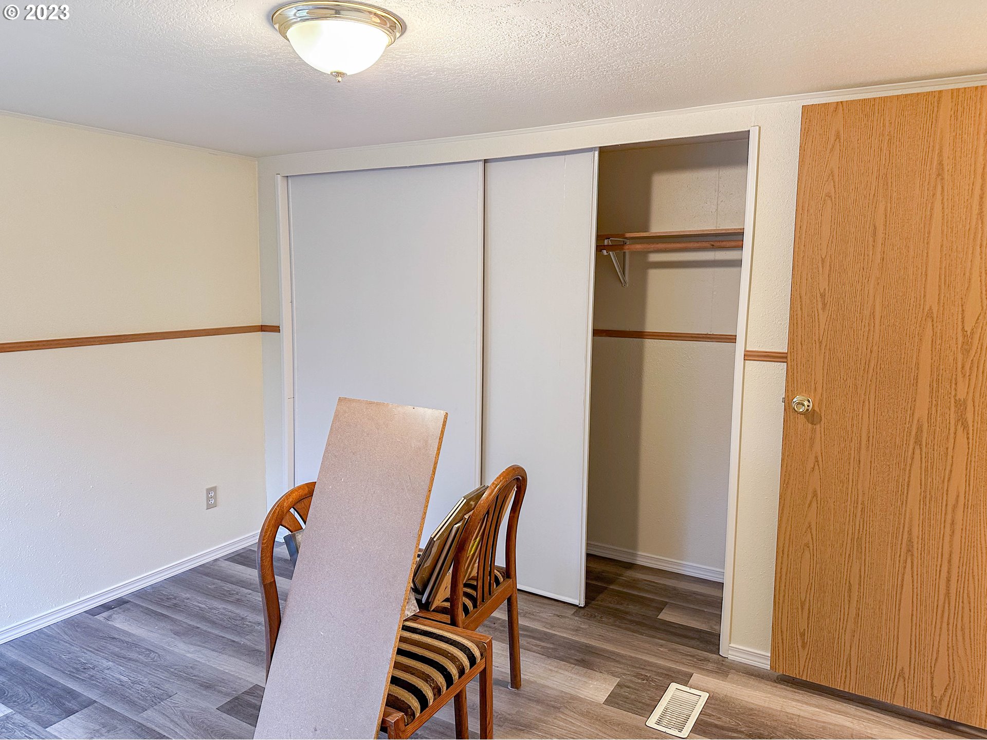 4475 Franklin Boulevard, Unit 13 Eugene, OR 97403 - Photo 10 of 22 a view of dining room with furniture and wooden floor