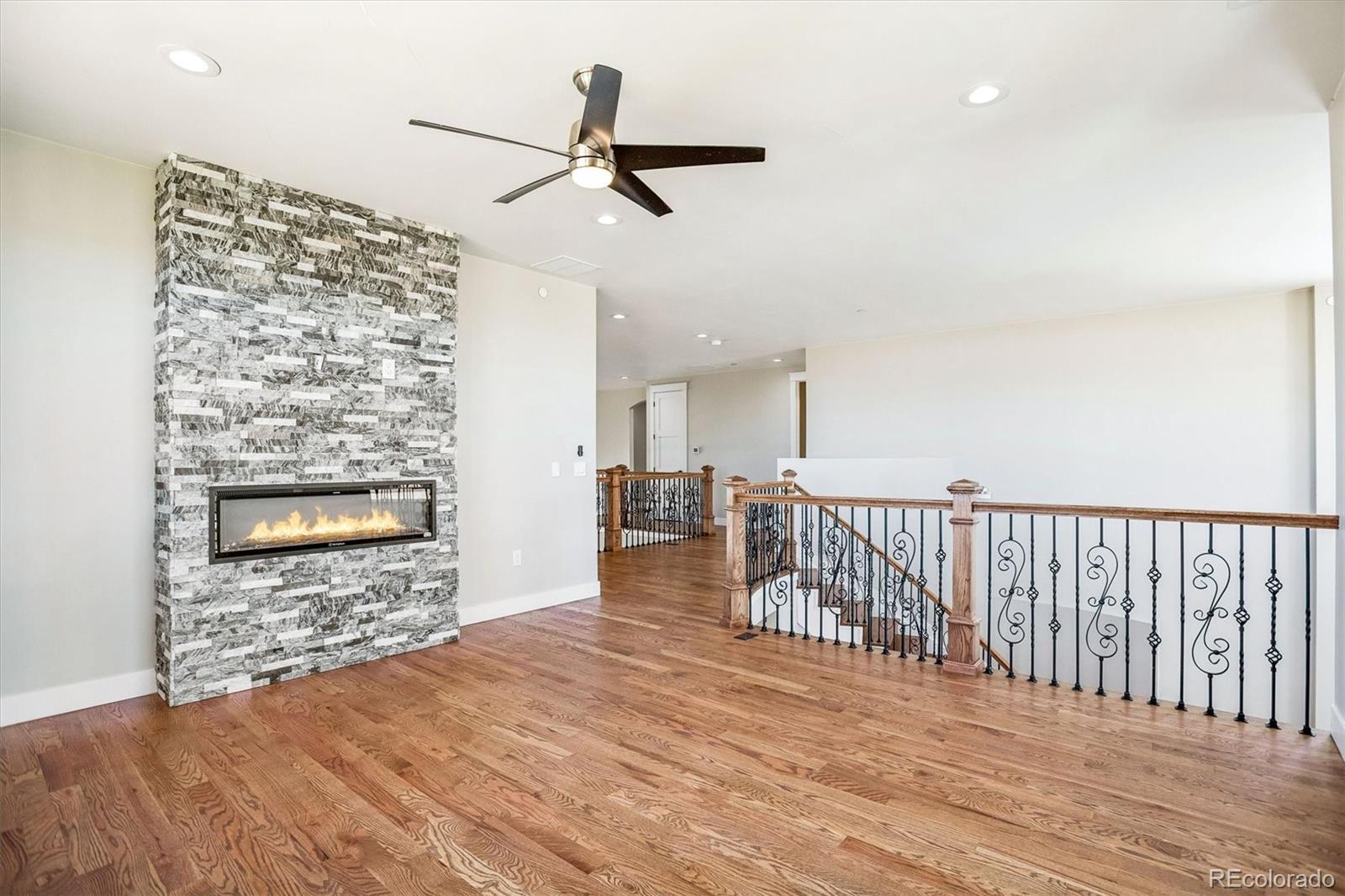 13350 Imboden Road Hudson, CO 80642 - Photo 16 of 50 a view of a hallway with wooden floor and entryway