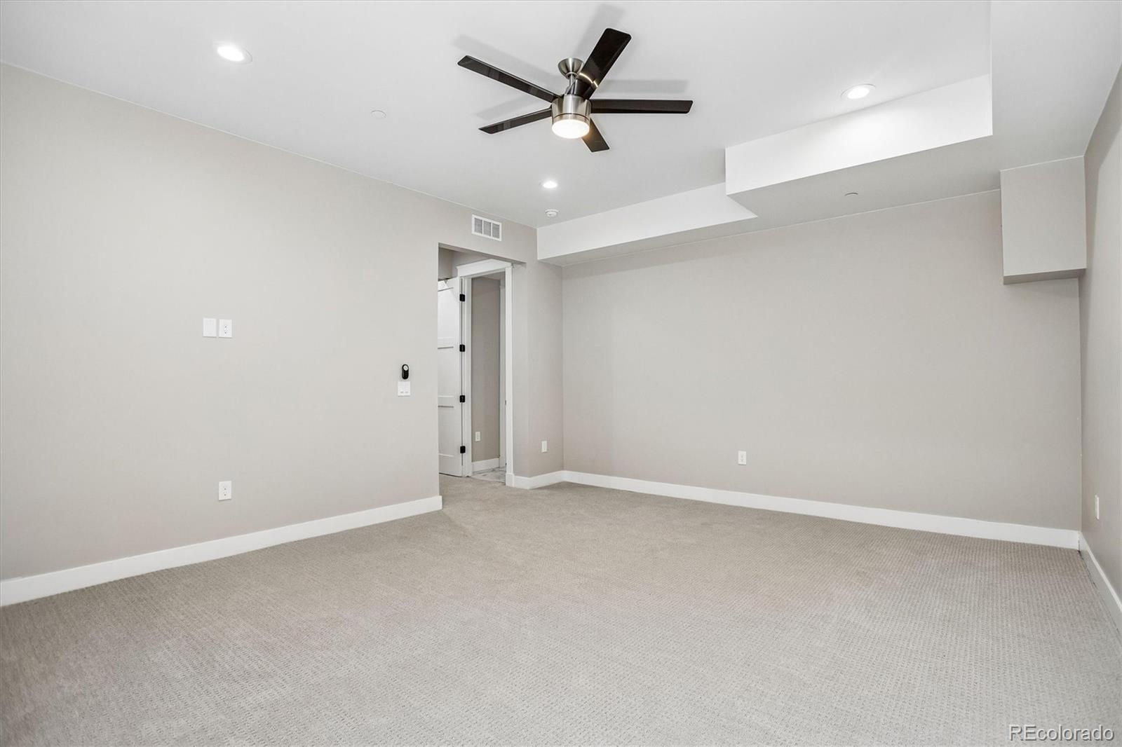 13350 Imboden Road Hudson, CO 80642 - Photo 22 of 50 an empty room with closet and a ceiling fan