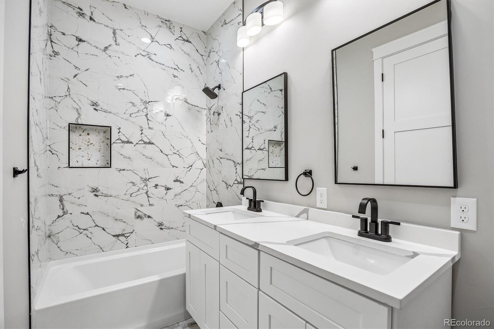 13350 Imboden Road Hudson, CO 80642 - Photo 24 of 50 a bathroom with a sink mirror toilet and bathtub