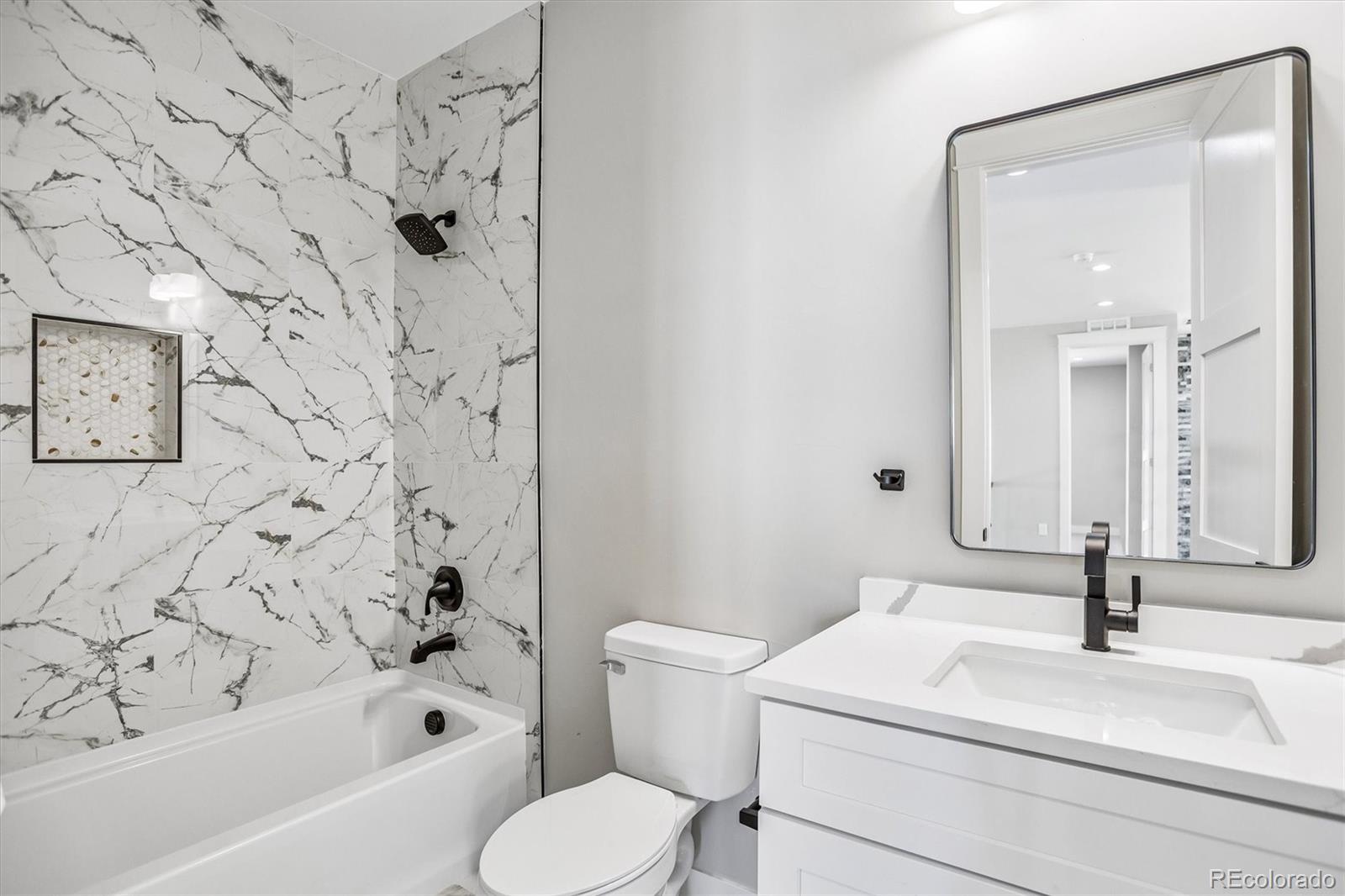 13350 Imboden Road Hudson, CO 80642 - Photo 27 of 50 a bathroom with a sink toilet and shower