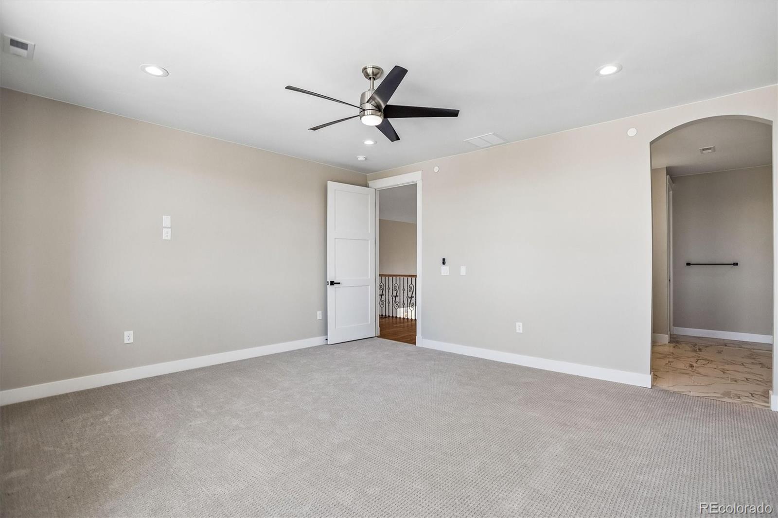 13350 Imboden Road Hudson, CO 80642 - Photo 32 of 50 an empty room with closet and windows