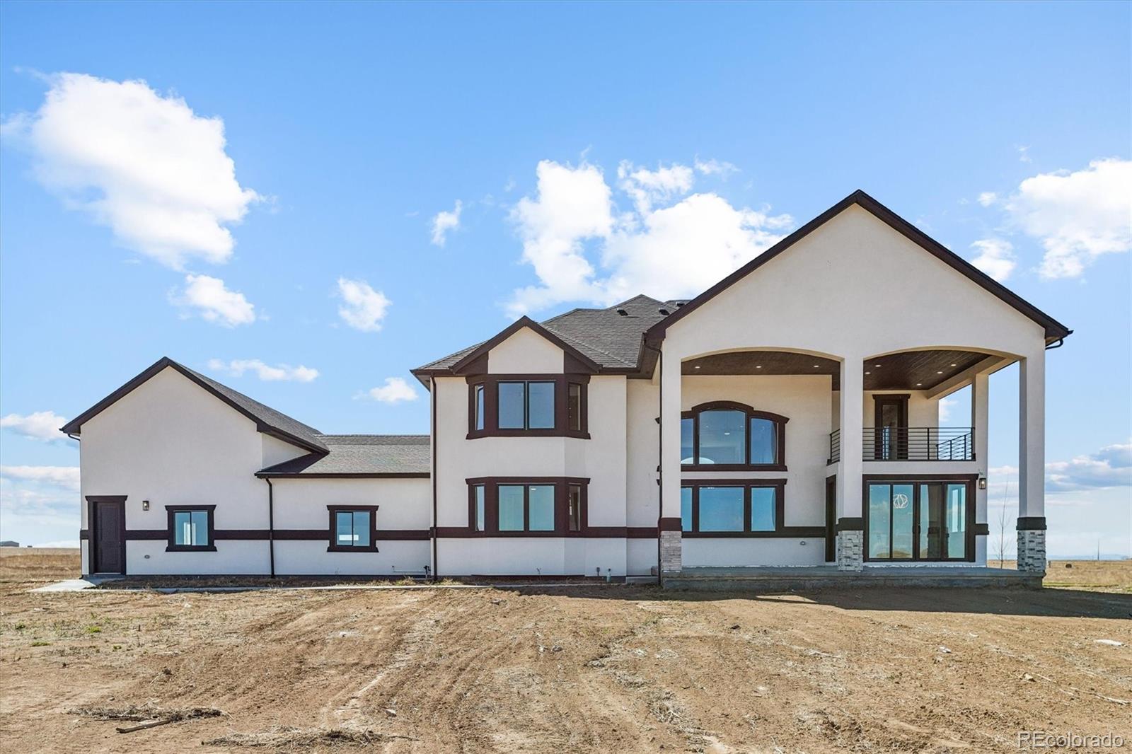 13350 Imboden Road Hudson, CO 80642 - Photo 44 of 50 a front view of a house with a yard
