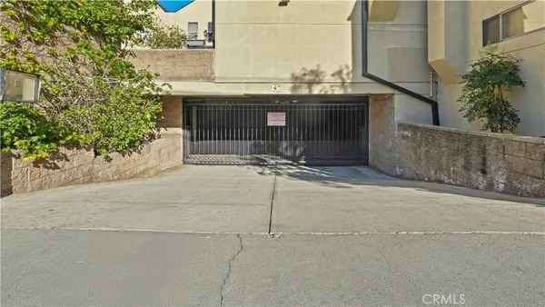 a front view of a house with a garage