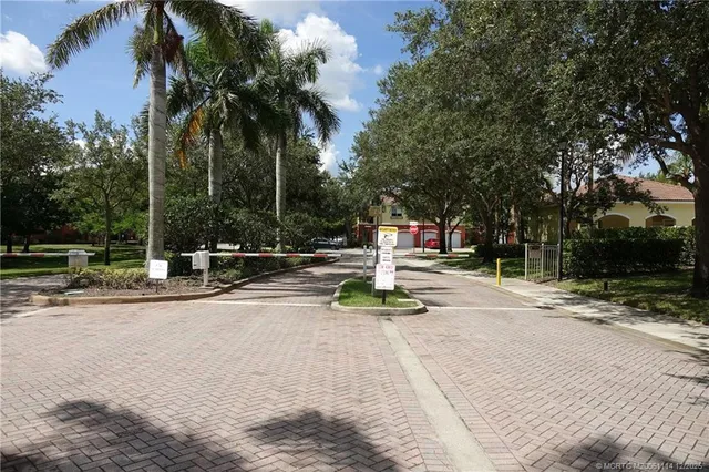 a view of a park with swings and slides