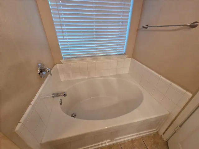 a bathroom with a bathtub
