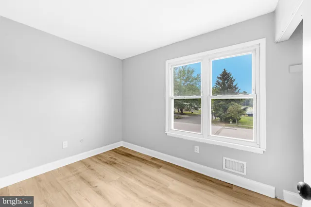 an empty room with a window