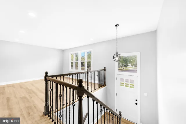 a view of hallway with windows