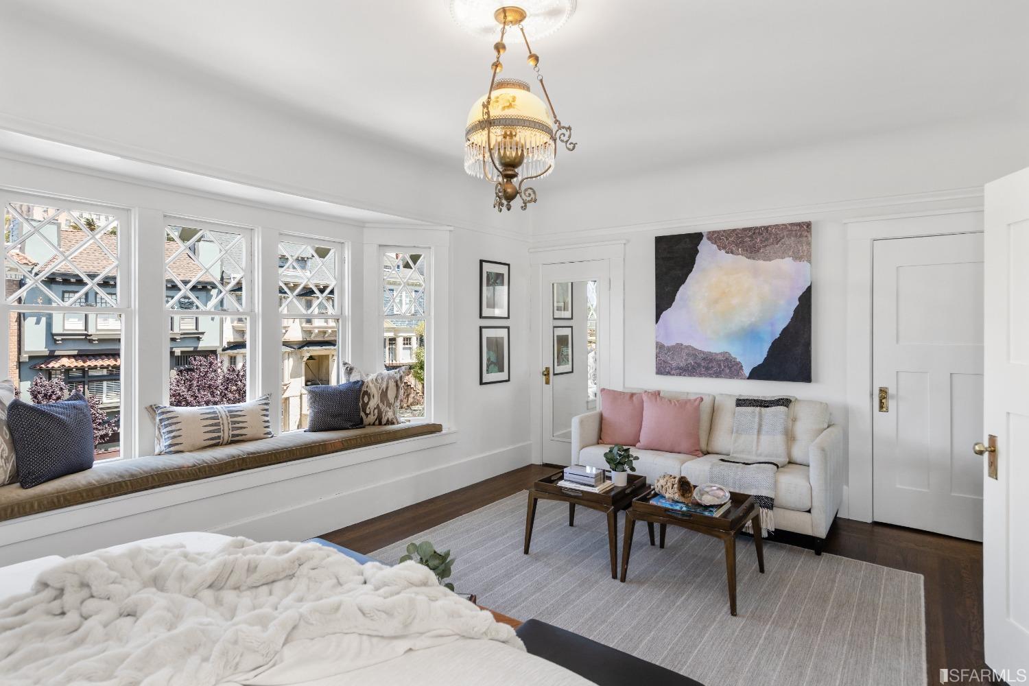6th Avenue San Francisco, CA 94122 - Photo 21 of 72 a living room with furniture and a chandelier