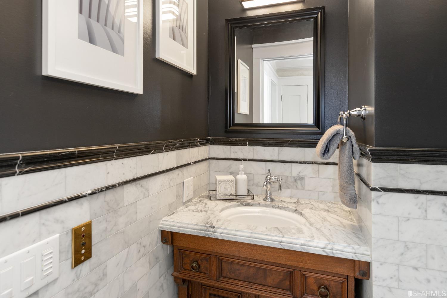 6th Avenue San Francisco, CA 94122 - Photo 34 of 72 a bathroom with a sink and a mirror