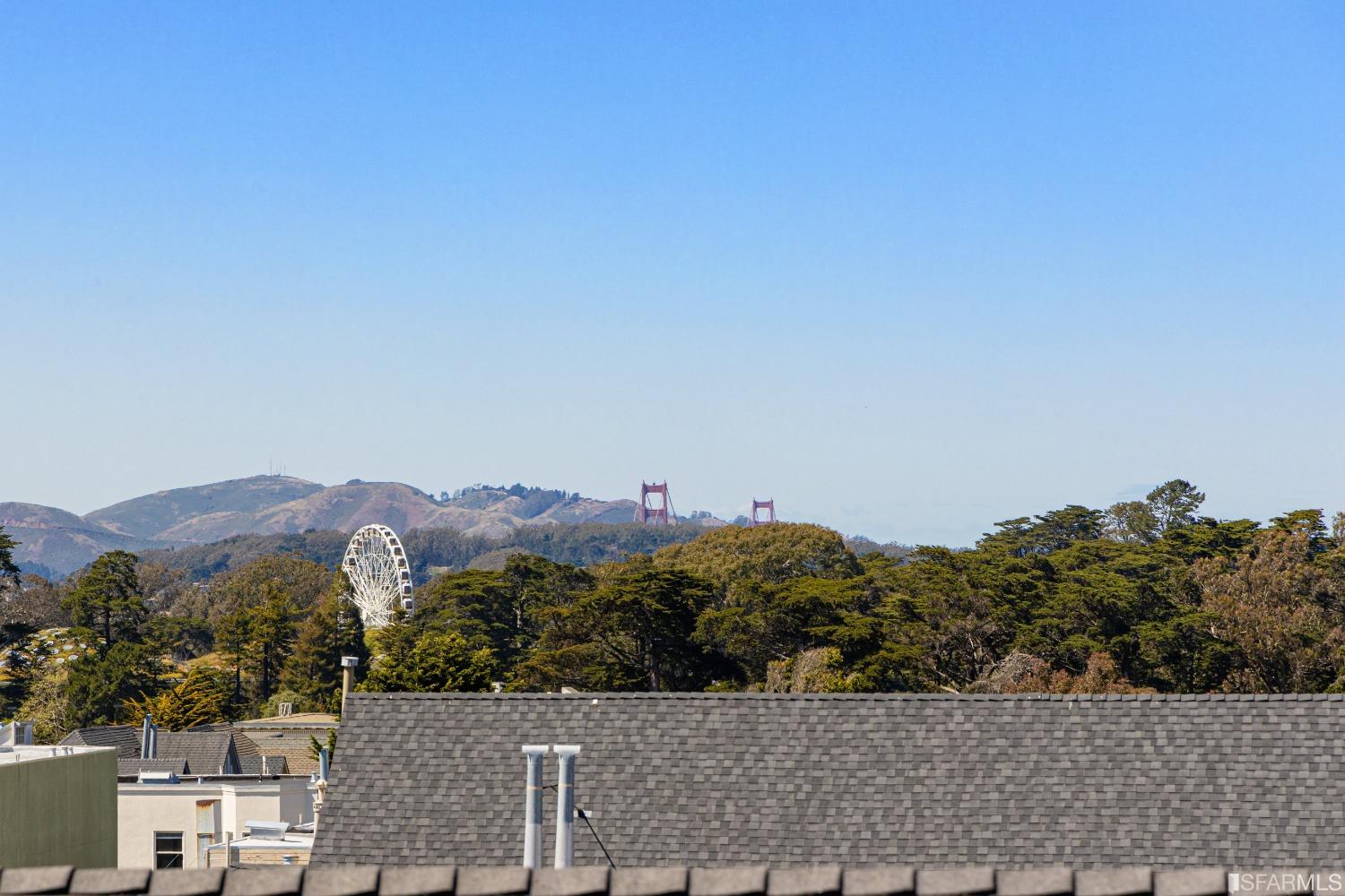 6th Avenue San Francisco, CA 94122 - Photo 39 of 72 a view of a large building with a mountain in the background