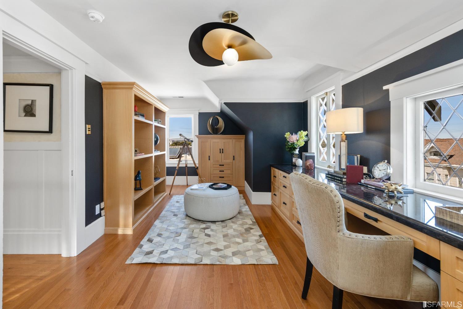 6th Avenue San Francisco, CA 94122 - Photo 40 of 72 a living room with furniture and a wooden floor