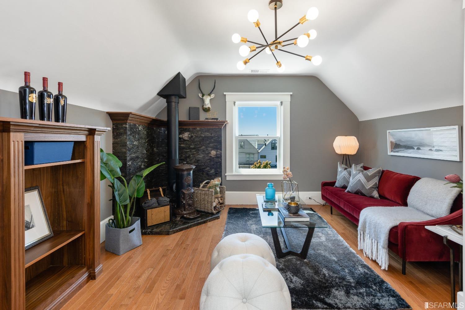 6th Avenue San Francisco, CA 94122 - Photo 44 of 72 a living room with furniture a window and a flat screen tv