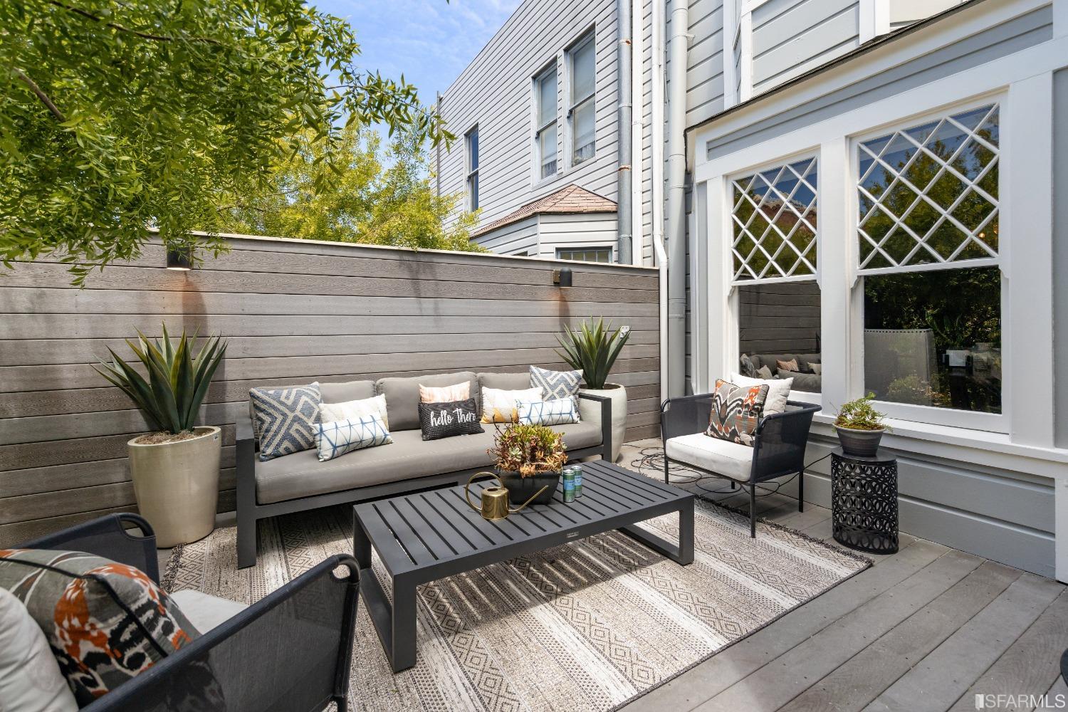 6th Avenue San Francisco, CA 94122 - Photo 51 of 72 a outdoor living room with furniture and a potted plant
