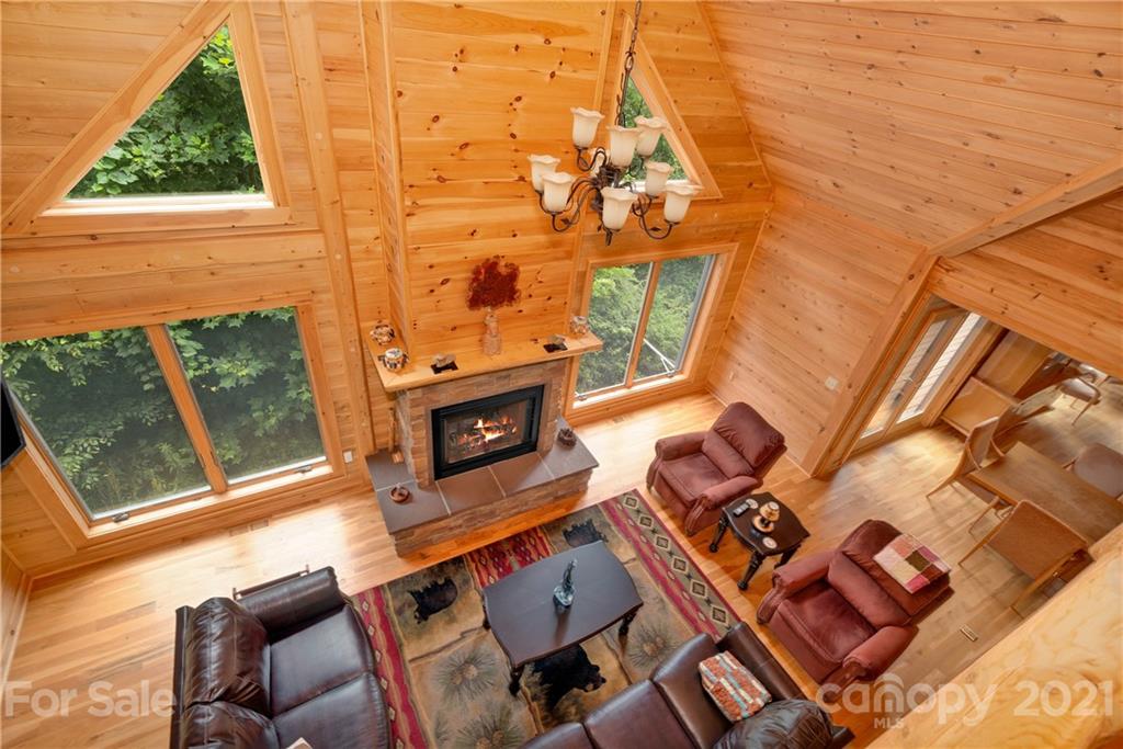 210 Angel Falls Road Clyde, NC 28721 - Photo 26 of 40 an outdoor living room with patio