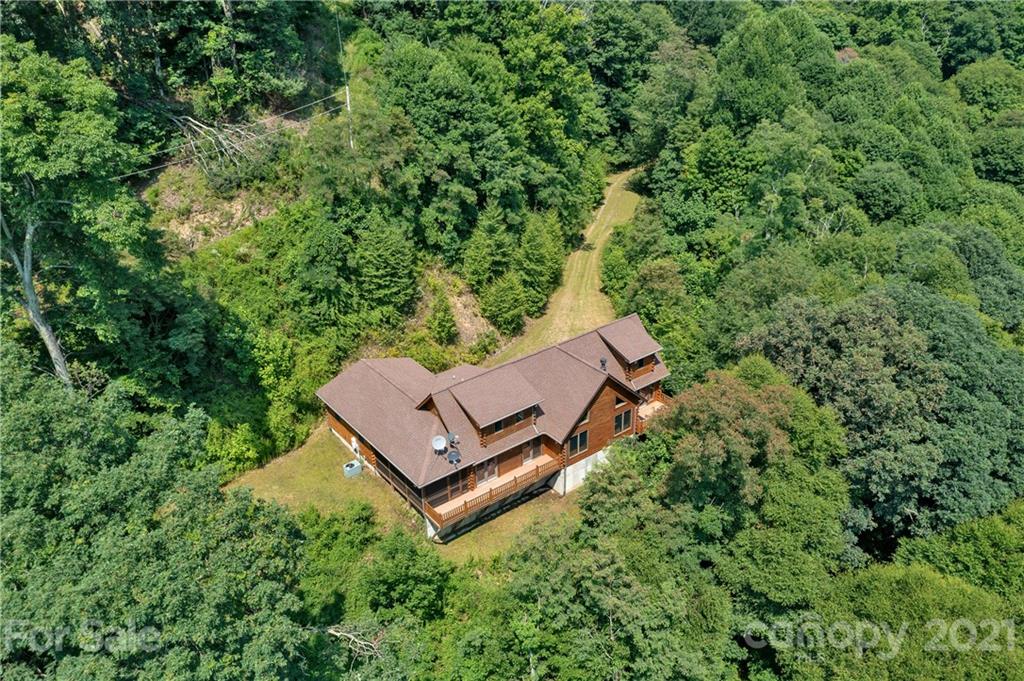 210 Angel Falls Road Clyde, NC 28721 - Photo 36 of 40 an aerial view of a house with a yard