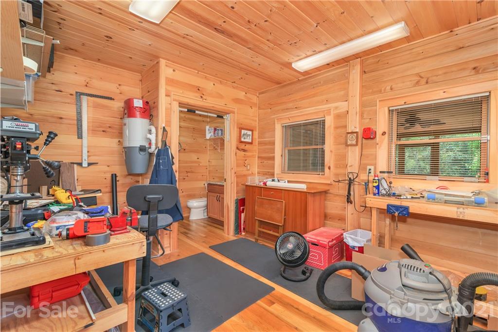 210 Angel Falls Road Clyde, NC 28721 - Photo 40 of 40 a room with furniture toys and a large window