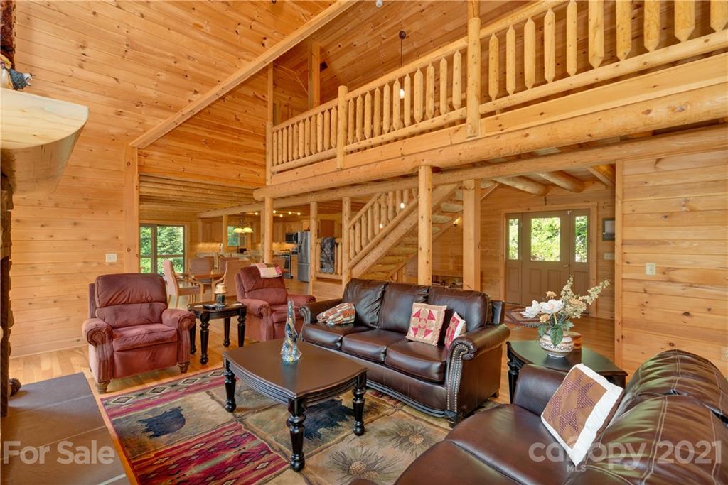 210 Angel Falls Road Clyde, NC 28721 - Photo 7 of 40 a outdoor living area with furniture