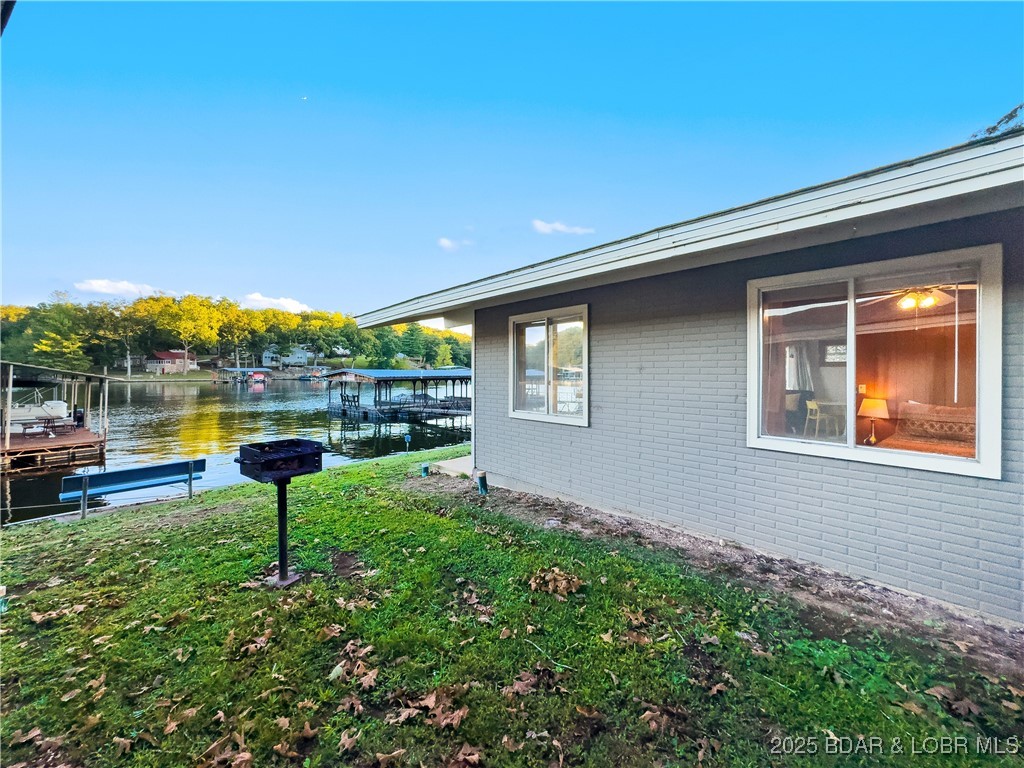 33303 Bass Point Road, Unit 14 Sunrise Beach, MO 65079 - Photo 23 of 30 Side View of Cabin