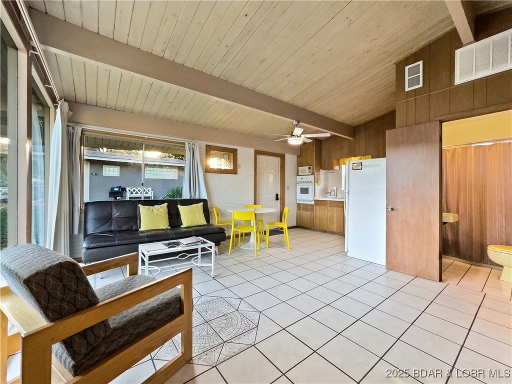 33303 Bass Point Road, Unit 14 Sunrise Beach, MO 65079 - Photo 6 of 30 Living Room-Dining-Kitchen