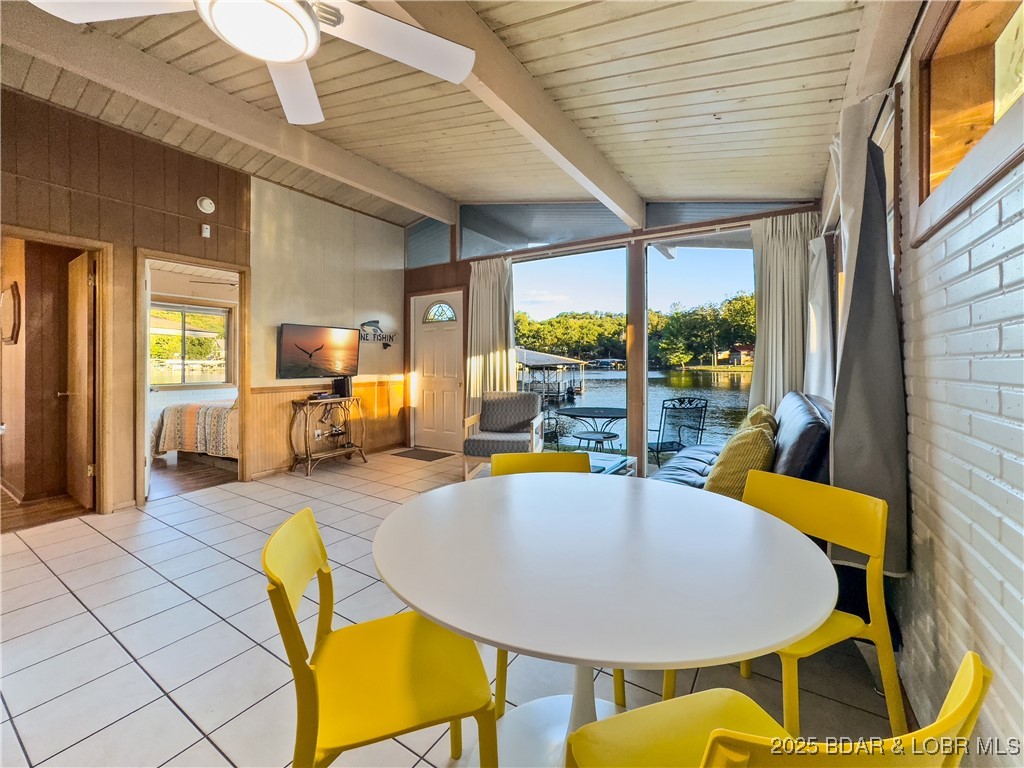 33303 Bass Point Road, Unit 14 Sunrise Beach, MO 65079 - Photo 8 of 30 Dining-Living Room Lake View