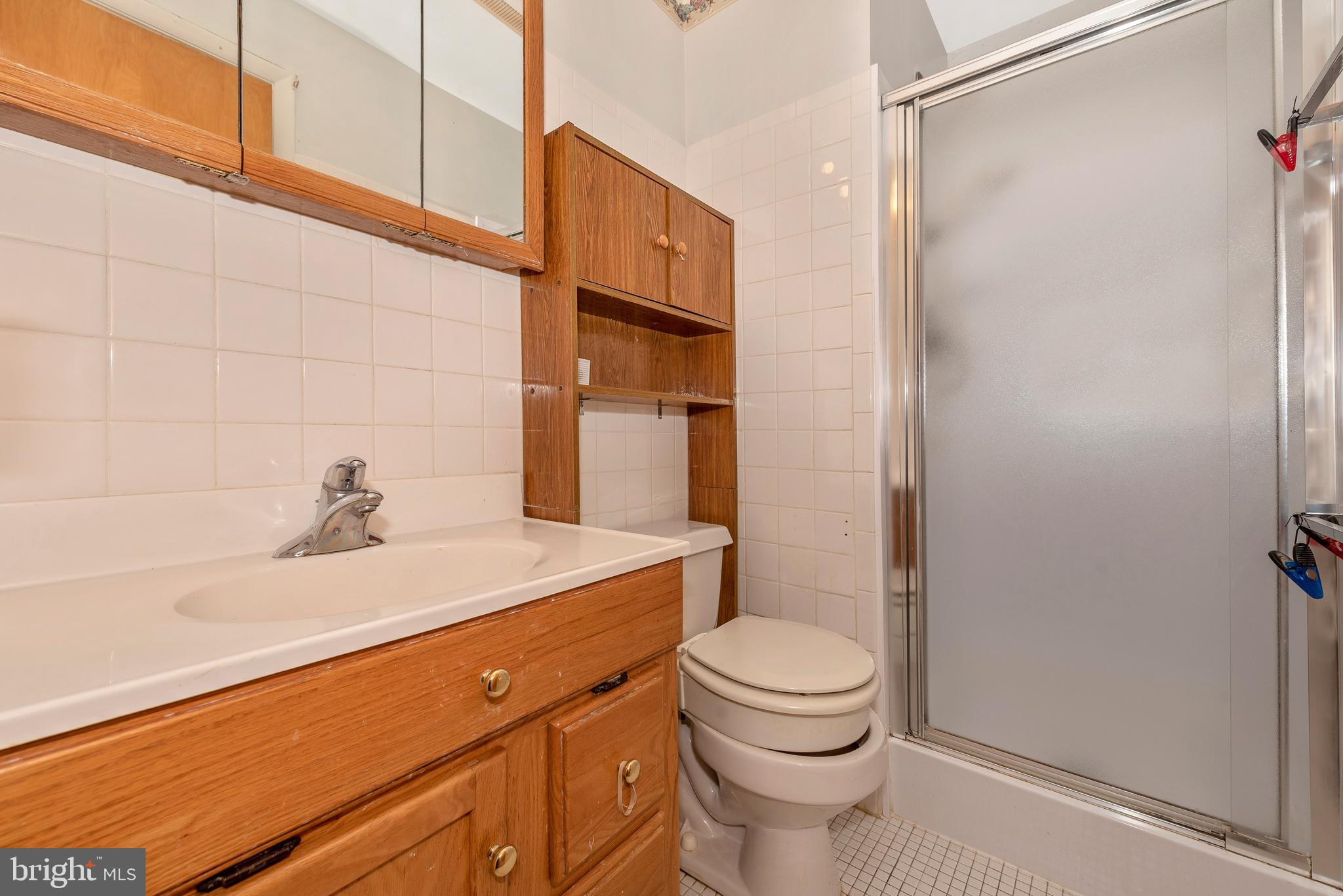 4210 Middleburg Road Union Bridge, MD 21791 - Photo 12 of 39 a bathroom with a sink a toilet and shower