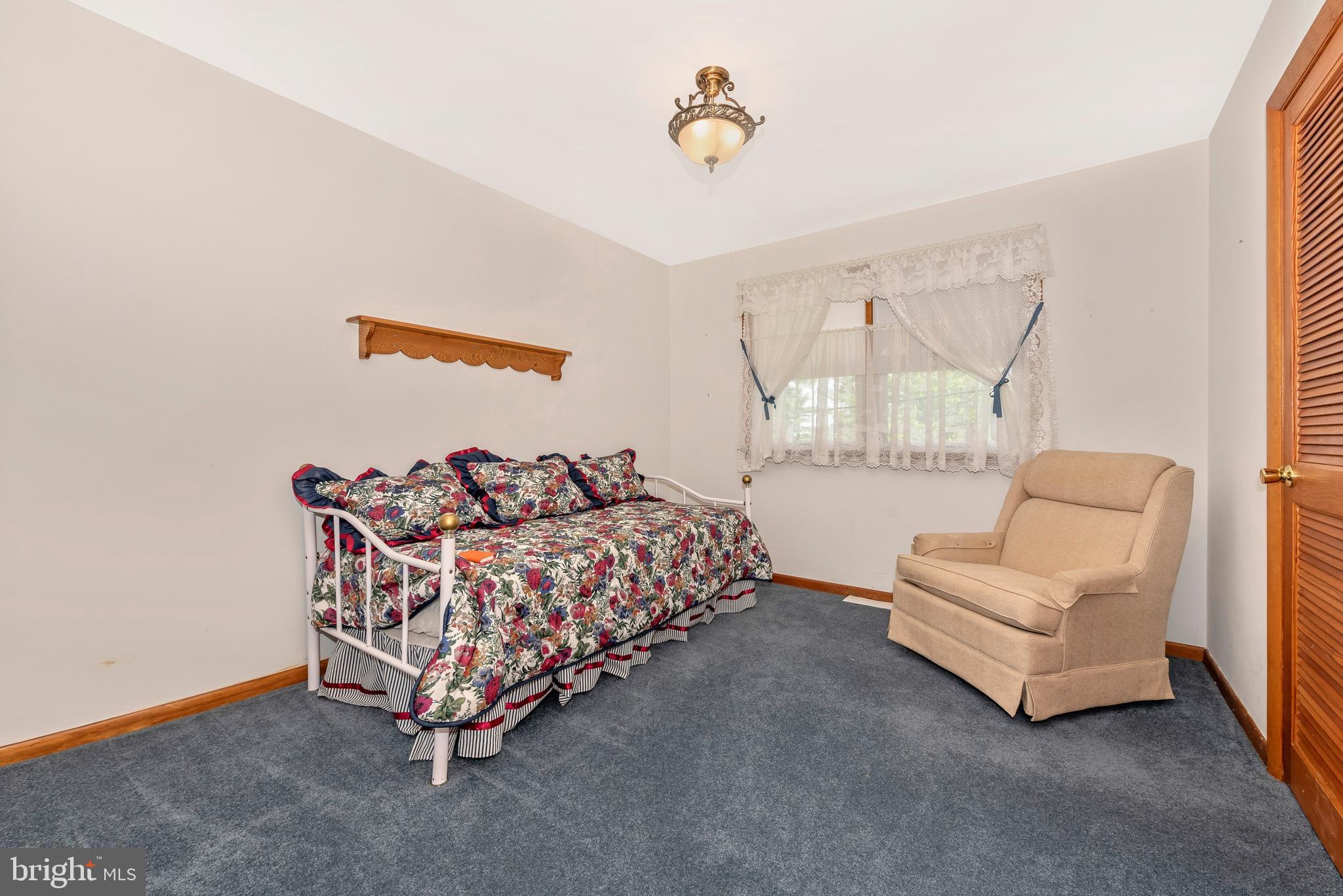 4210 Middleburg Road Union Bridge, MD 21791 - Photo 15 of 39 a bed room with a bed and a couch