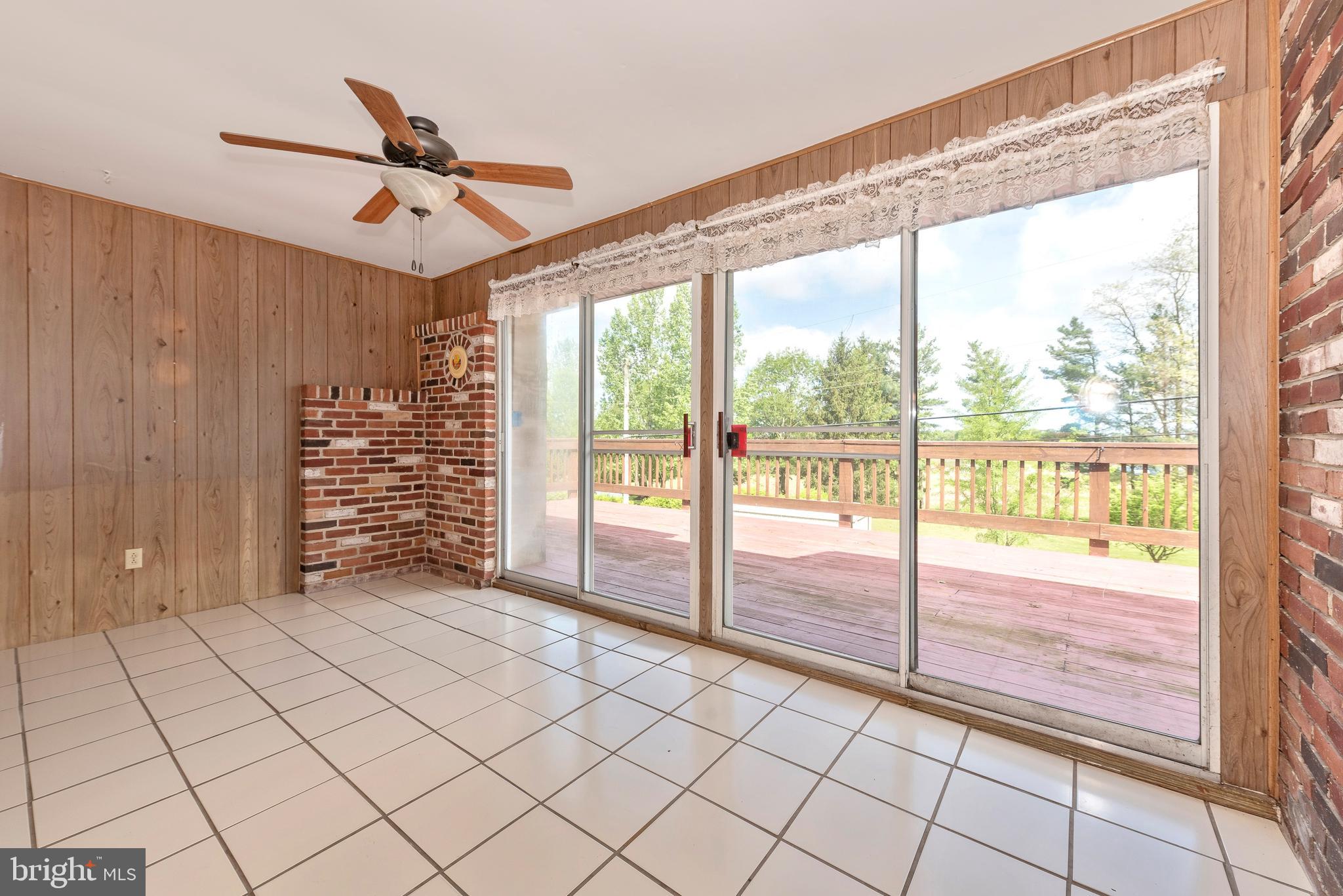 4210 Middleburg Road Union Bridge, MD 21791 - Photo 7 of 39 a view of an empty room and window ceiling fan
