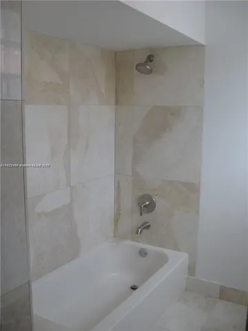 a bathroom with a sink and vanity