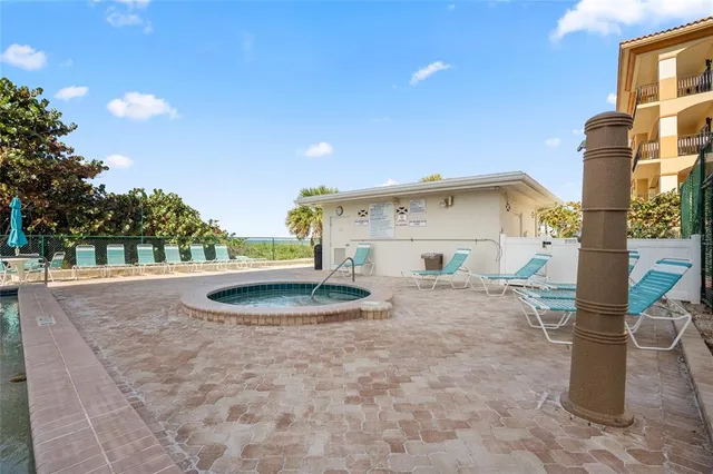 a backyard of a house with a yard and garage