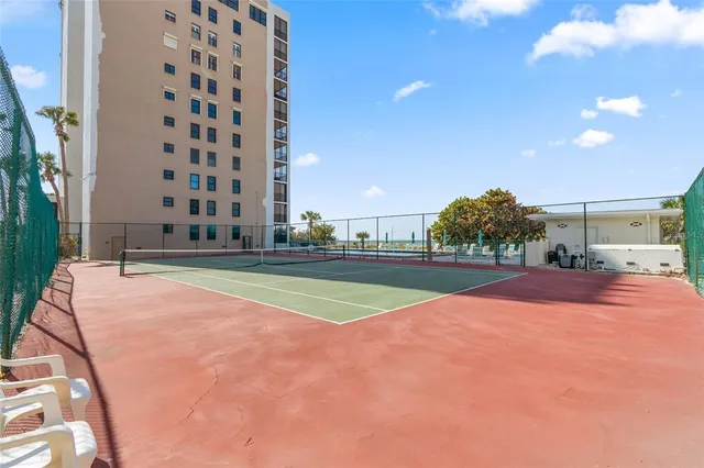 a view of a building with a big yard
