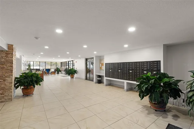 a view of a living room and entry way