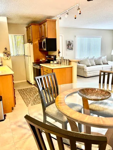 a utility room with cabinets