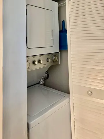 a view of a swimming pool and lounge chair