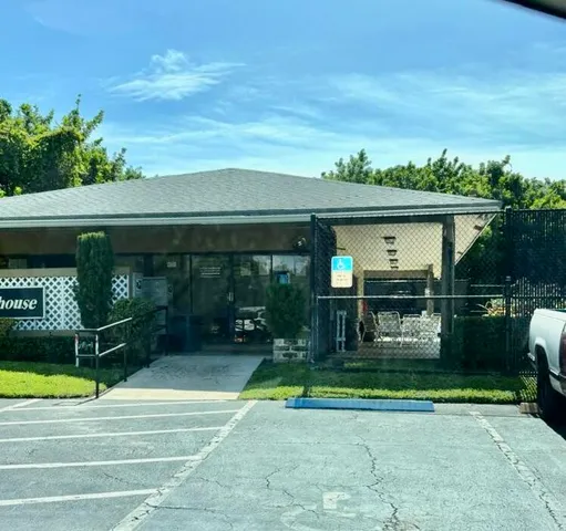 a view of swimming pool with a patio