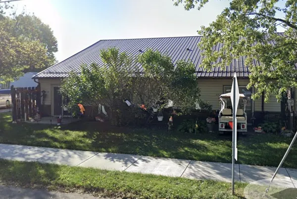 a view of a room with large windows